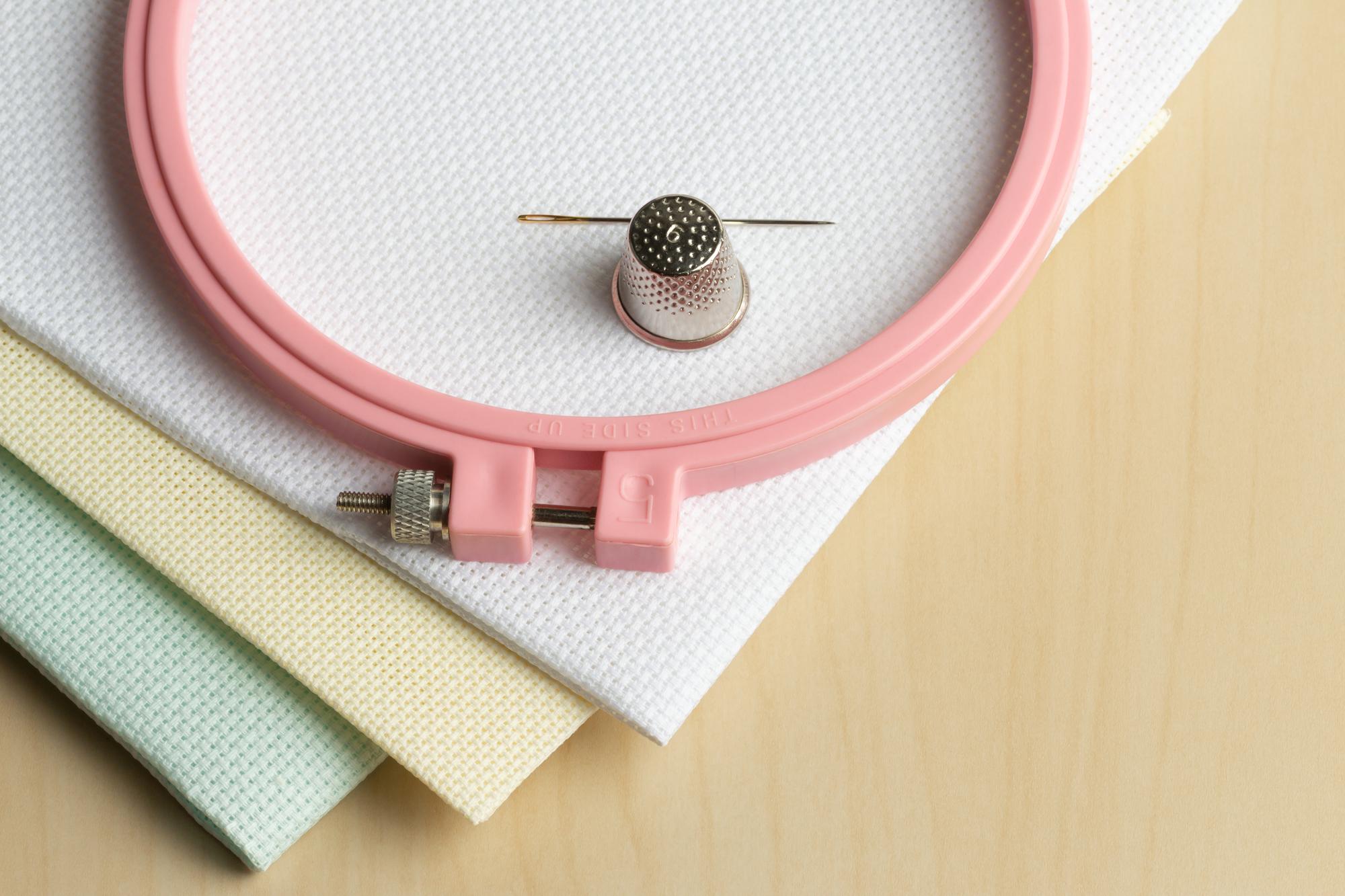 Close-up of hand-stitched embroidery in progress